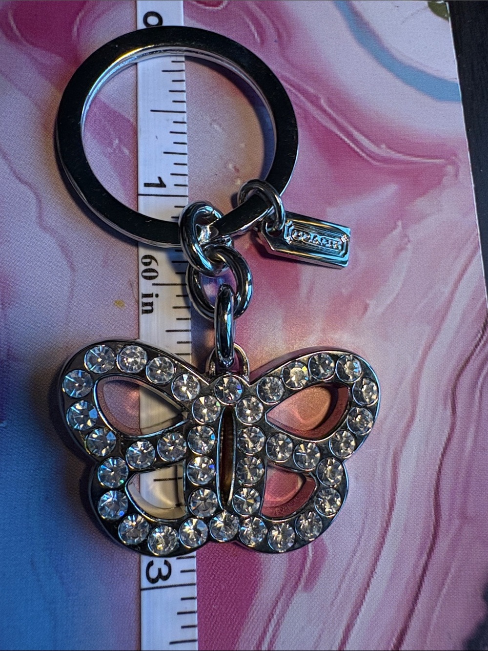 Coach Silver-Tone Butterfly Keychain with Crystal Accents